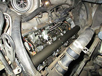 Driver side valve cover removed from engine