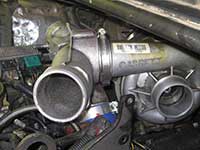 Plenum to turbocharger clamp